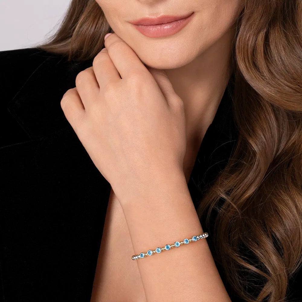 Gabriel & Co., 14K Yellow Gold and 925 Sterling Silver BlueTopaz Bezel Set Bujukan Split Bangle Bracelet