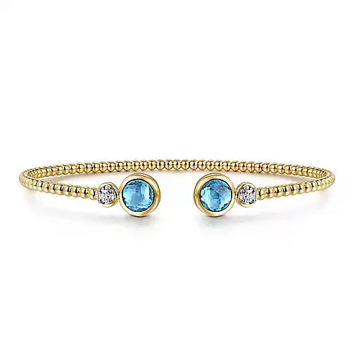 Gabriel & Co., 14K White and Yellow Gold Bujukan Diamond and Blue Topaz Bangle