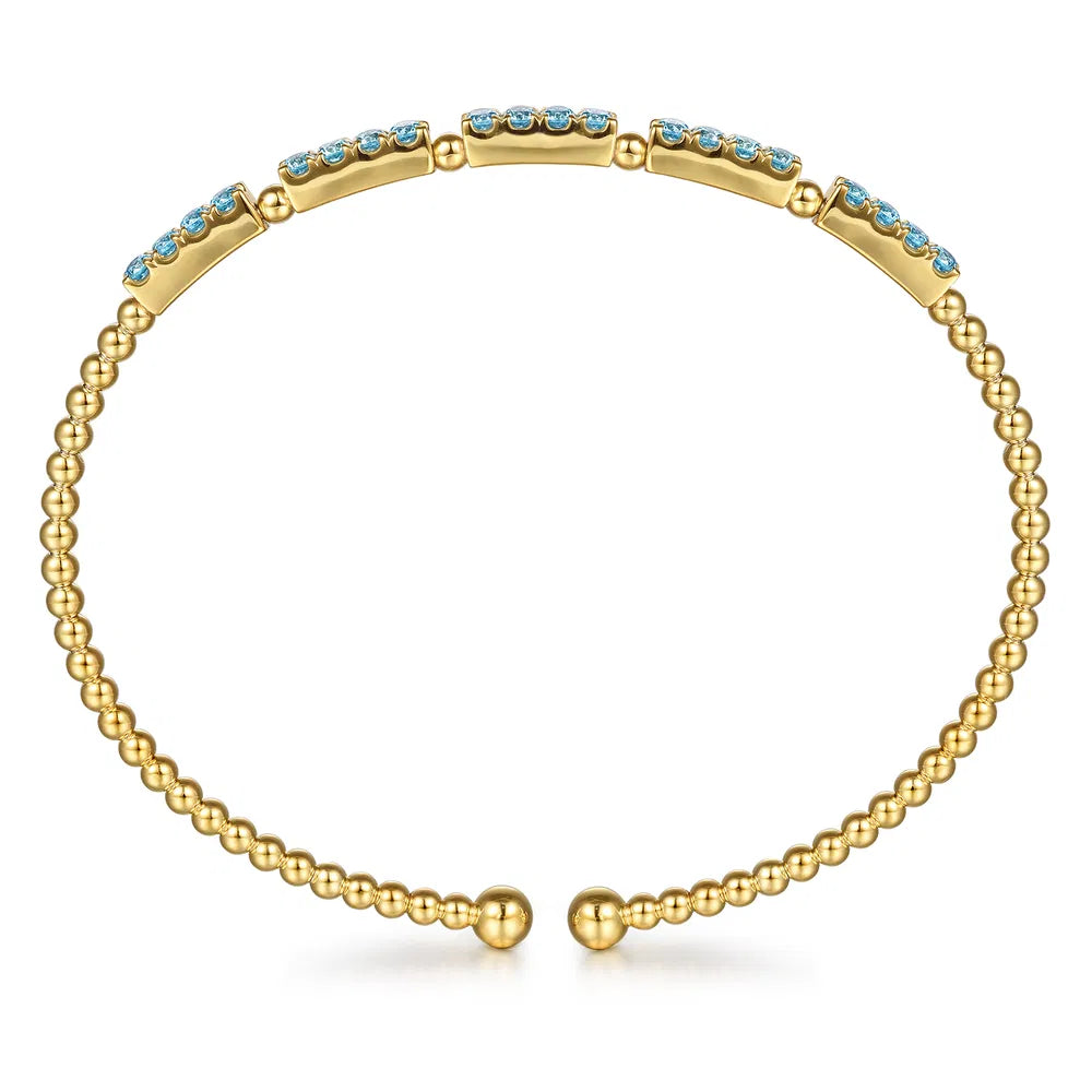 Gabriel & Co., 14K Yellow Gold Bujukan Beads and Blue Topaz Split Bangle Bracelet