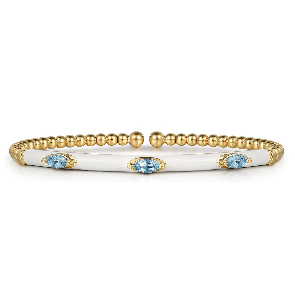 Gabriel & Co., 14K Yellow Gold Bujukan Blue Topaz Split Bangle with White Enamel