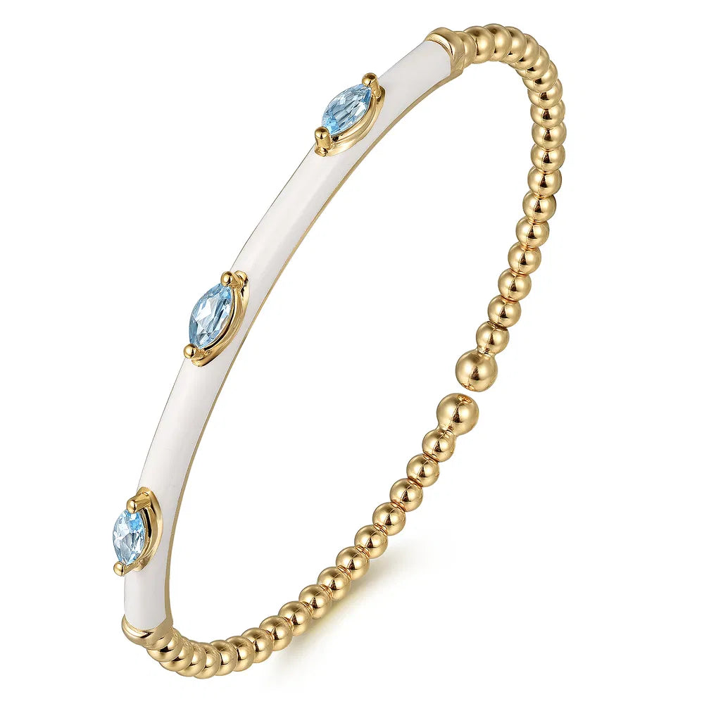 Gabriel & Co., 14K Yellow Gold Bujukan Blue Topaz Split Bangle with White Enamel