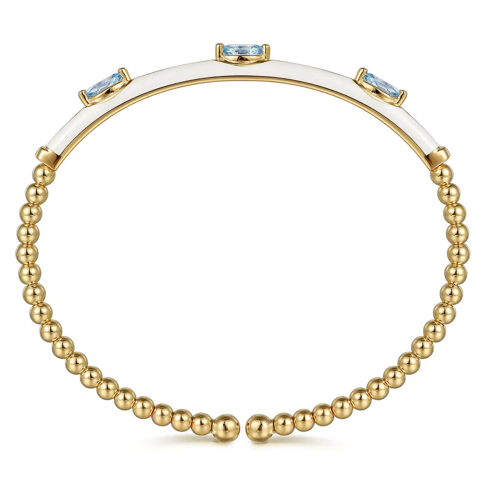 Gabriel & Co., 14K Yellow Gold Bujukan Blue Topaz Split Bangle with White Enamel