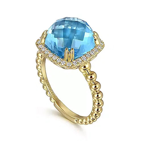 Gabriel & Co., 14K Yellow Gold Bujukan Cushion Blue Topaz with Diamond Halo Ring