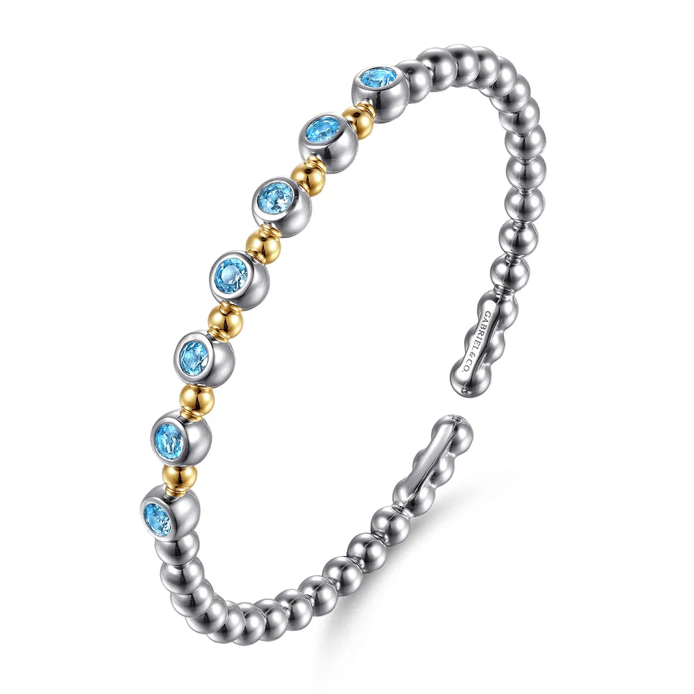 Gabriel & Co., 14K Yellow Gold and 925 Sterling Silver BlueTopaz Bezel Set Bujukan Split Bangle Bracelet