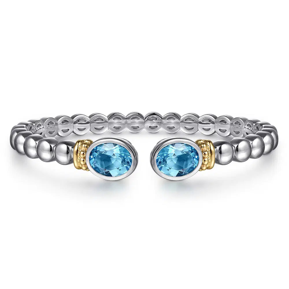 Gabriel & Co., 14K Yellow Gold and 925 Sterling Silver Bujukan Blue Topaz Open Bangle Bracelet