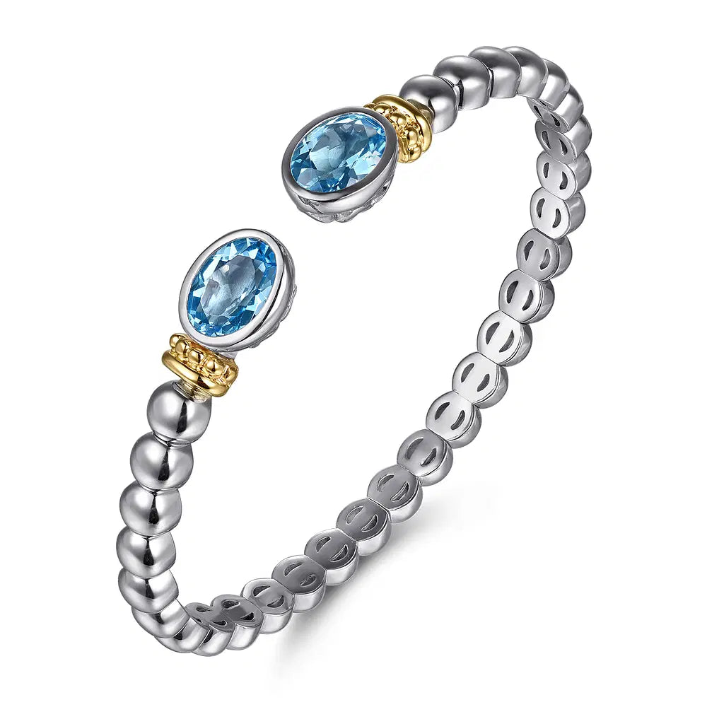 Gabriel & Co., 14K Yellow Gold and 925 Sterling Silver Bujukan Blue Topaz Open Bangle Bracelet